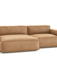 The Baker Modular Sofa | Leather • M3 by Wooden Stories features a modern tan leather design with wide armrests, plush cushions, and a low back, shown against a white background.