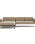 The Department Modular Sofa | Fabric • M4 by Wooden Stories, a beige sectional with a left-facing chaise, metal legs, and clean Danish-inspired lines, is set against a plain white background.