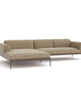 The Department Modular Sofa | Fabric • M4 by Wooden Stories features a modern beige design with a left-facing chaise, slim black metal legs, low-profile cushioned back and arms, and an elegant FSC-certified oak solid wood base.