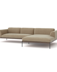 The Wooden Stories Department Modular Sofa | Fabric • M4 is a modern beige sectional with a right chaise, slim black metal legs, and minimalist Danish-inspired design, shown against a white background.