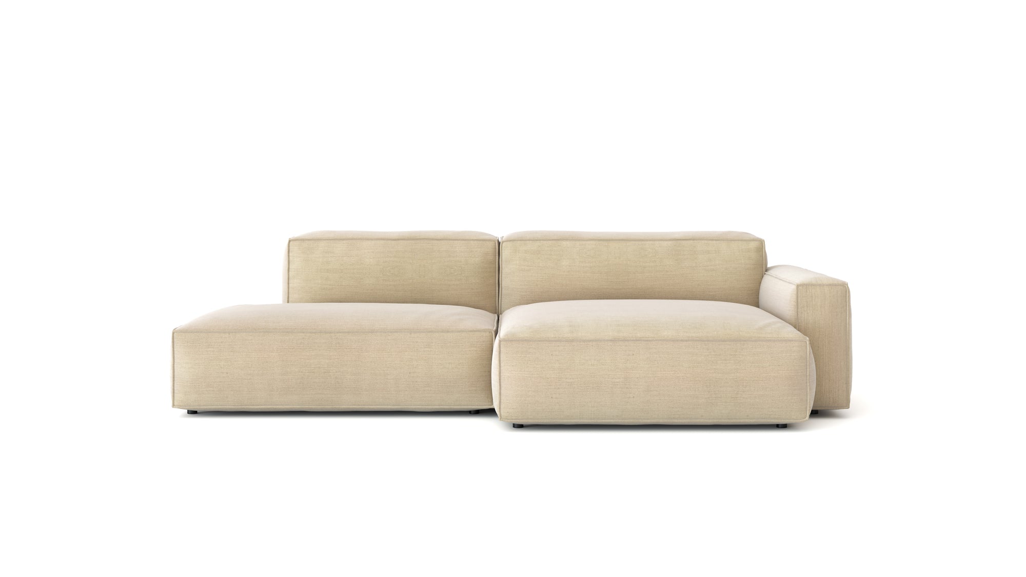 The Baker Modular Sofa | Fabric • M4 by Wooden Stories is a contemporary beige sofa with a low backrest, wide right armrest, and left chaise lounge featuring plush feather filling, shown against a white background.