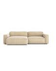 The Baker Modular Sofa | Fabric • M5 by Wooden Stories is a modern beige two-seater with plush boxy cushions and wide armrests, set against a plain white background—a contemporary furniture statement.