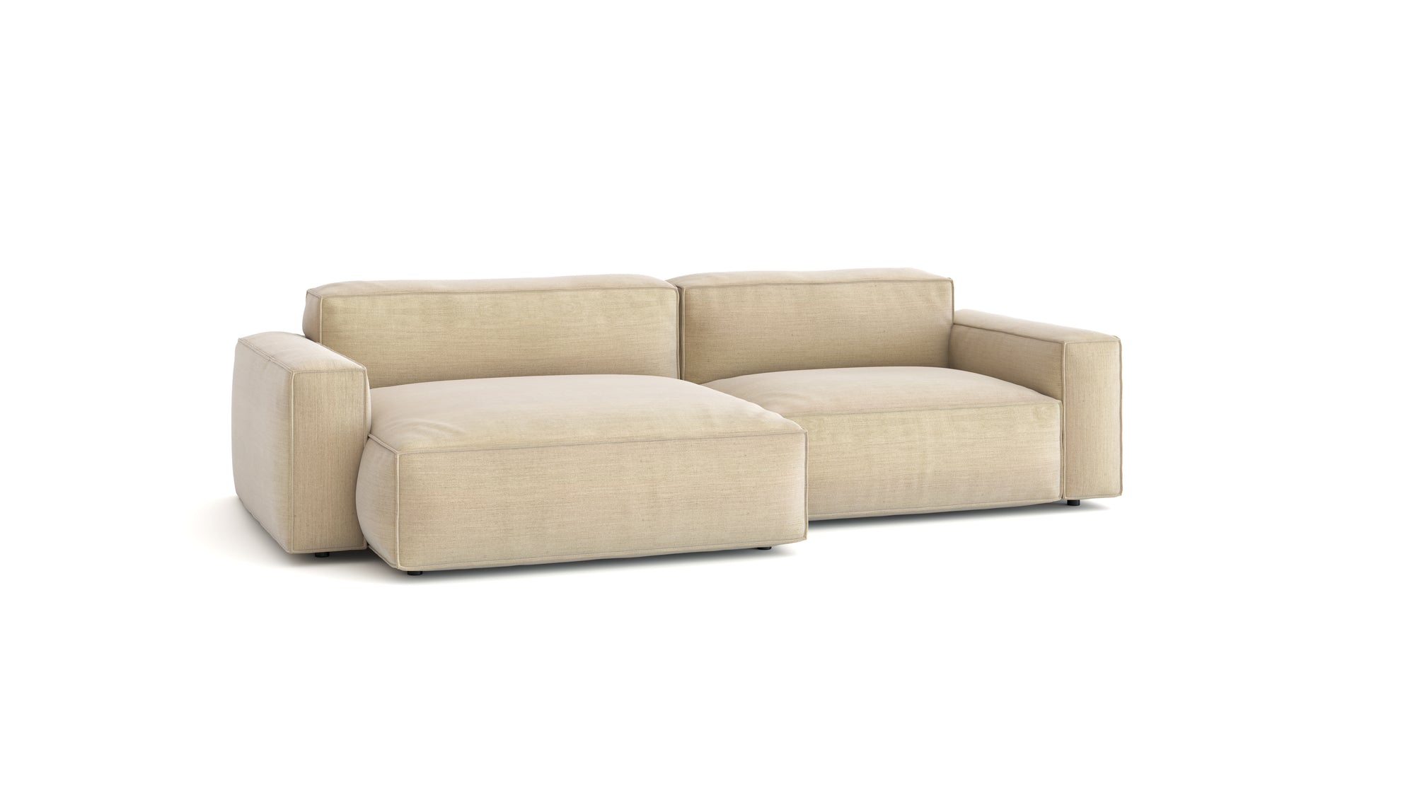 The Baker Modular Sofa | Fabric • M5 by Wooden Stories is a modern beige sofa with wide armrests and plush cushions, showcased against a plain white background for an elegant, contemporary look.