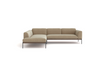 The Department Modular Sofa | Fabric • M6 by Wooden Stories is a modern beige L-shaped sectional with slim black metal legs and a low FSC-certified oak base, shown against a plain white background.