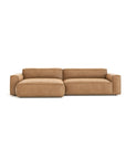 The Baker Modular Sofa | Leather • M6 by Wooden Stories is a modern tan leather sofa with wide armrests and clean lines, displayed against a plain white background.