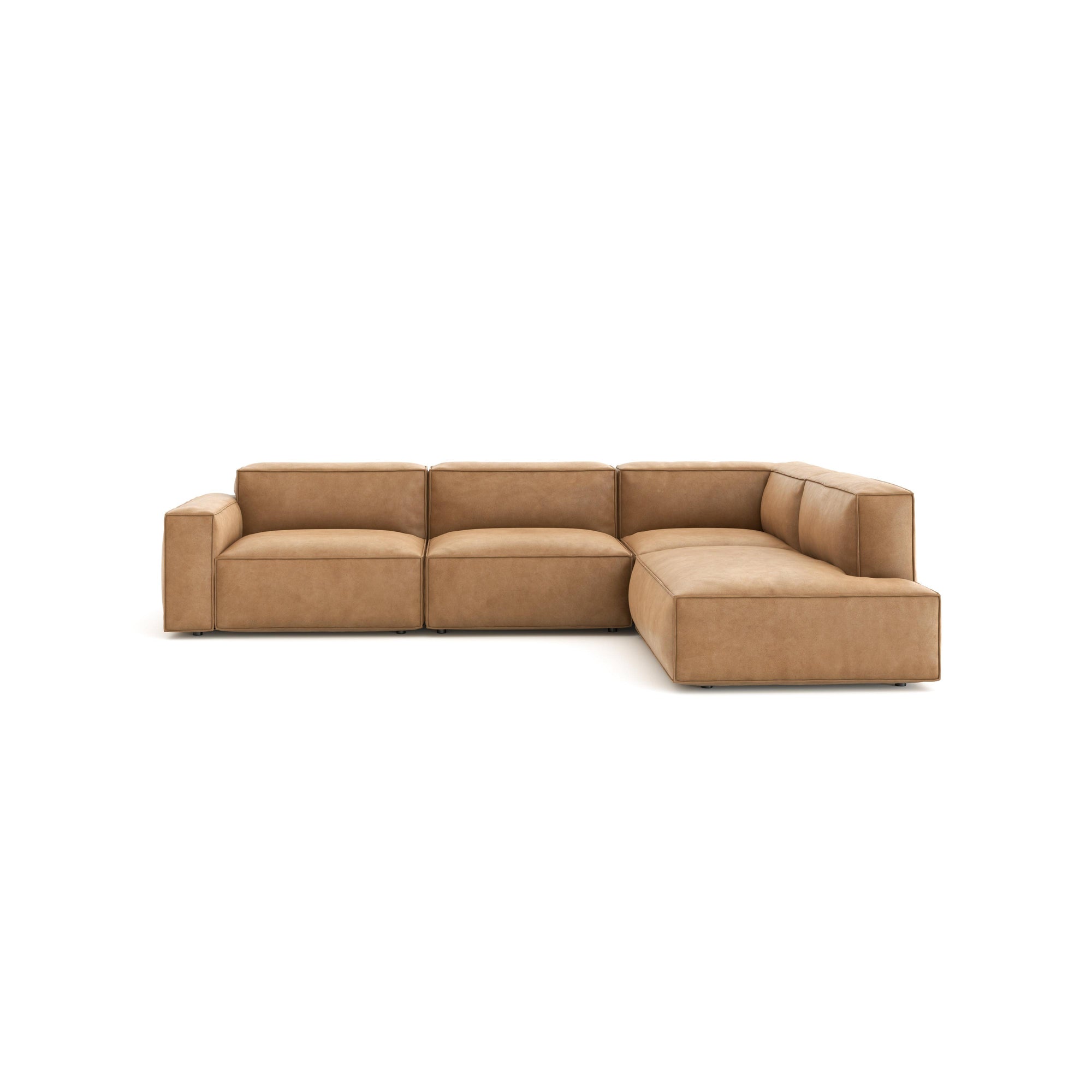 The Baker Modular Sofa | Leather • M7 by Wooden Stories features a tan leather L-shape with deep seats and a low back, adding contemporary style to any space.