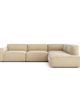 The Baker Modular Sofa | Fabric • M7 by Wooden Stories features plush cushions and a low-profile L-shape in modern beige, combining comfort and versatility for any contemporary setting.