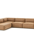 The Baker Modular Sofa | Leather • M7 by Wooden Stories is an L-shaped, light brown leather sofa with wide armrests and low backrests, ideal for any contemporary setting.