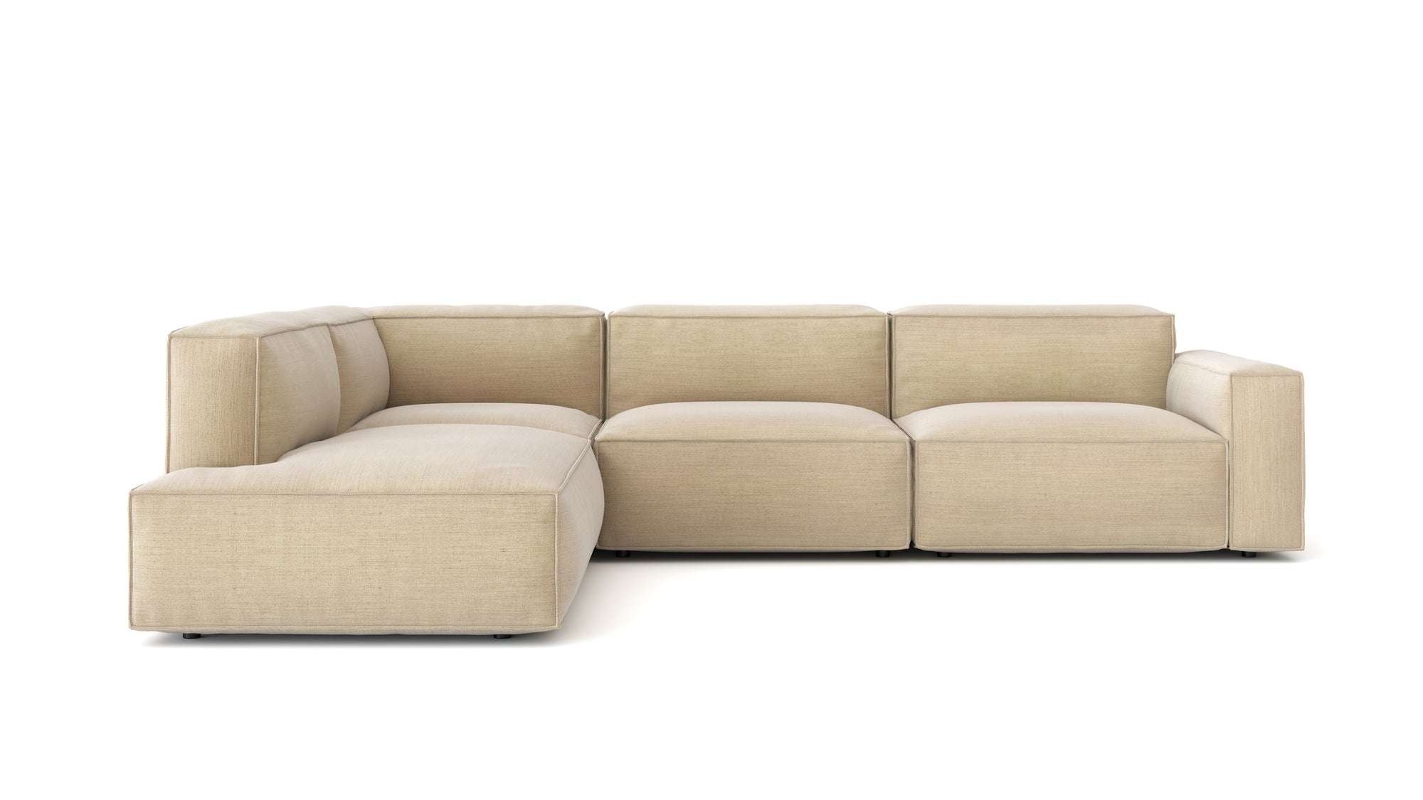 The Baker Modular Sofa | Fabric • M7 by Wooden Stories is a modern, beige L-shaped sofa with plush cushions and a minimalist design, shown against a white background.
