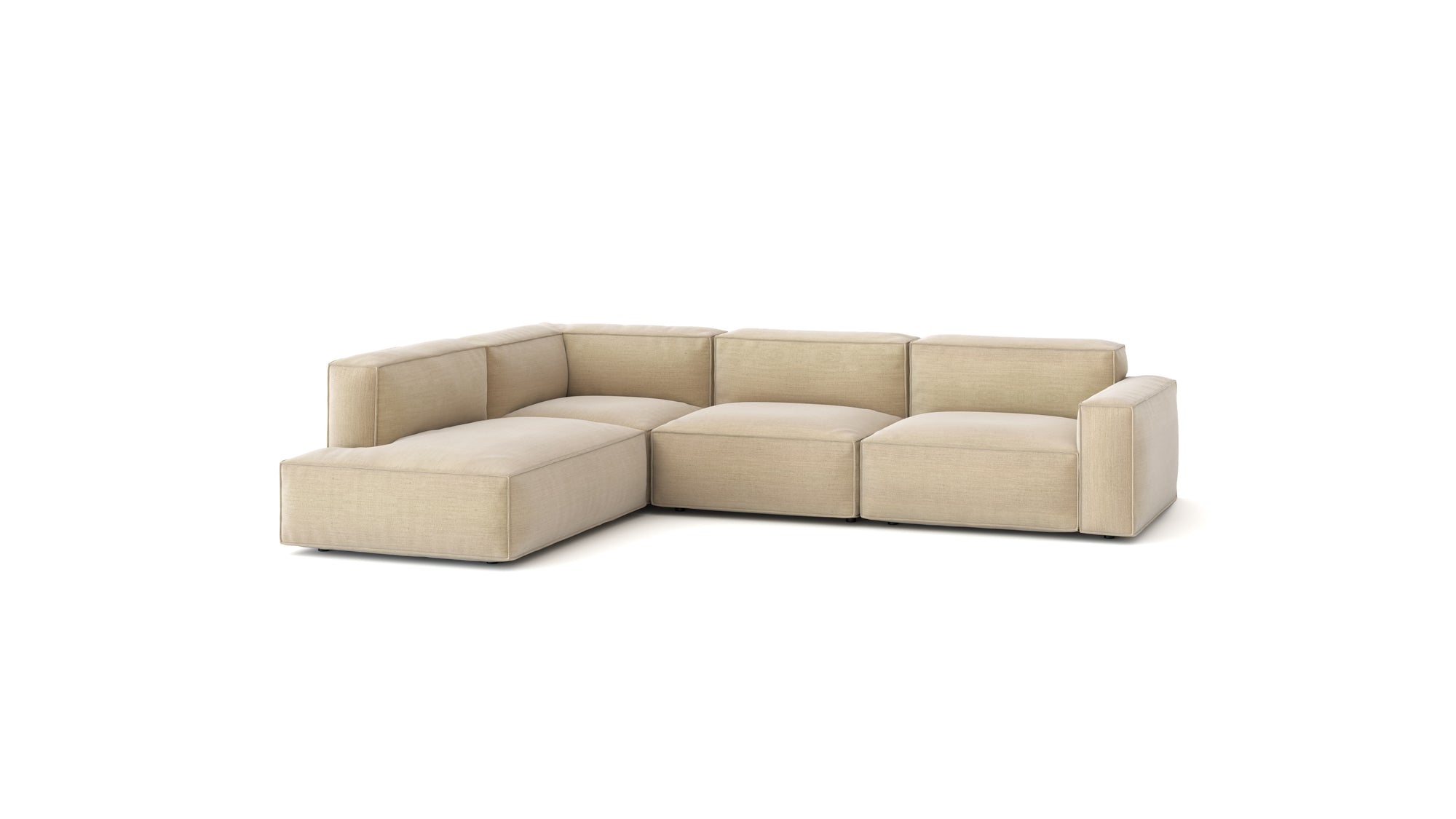 The Baker Modular Sofa | Fabric • M7 by Wooden Stories is a beige, contemporary L-shaped sofa with thick cushions and a low back, set against a white background.