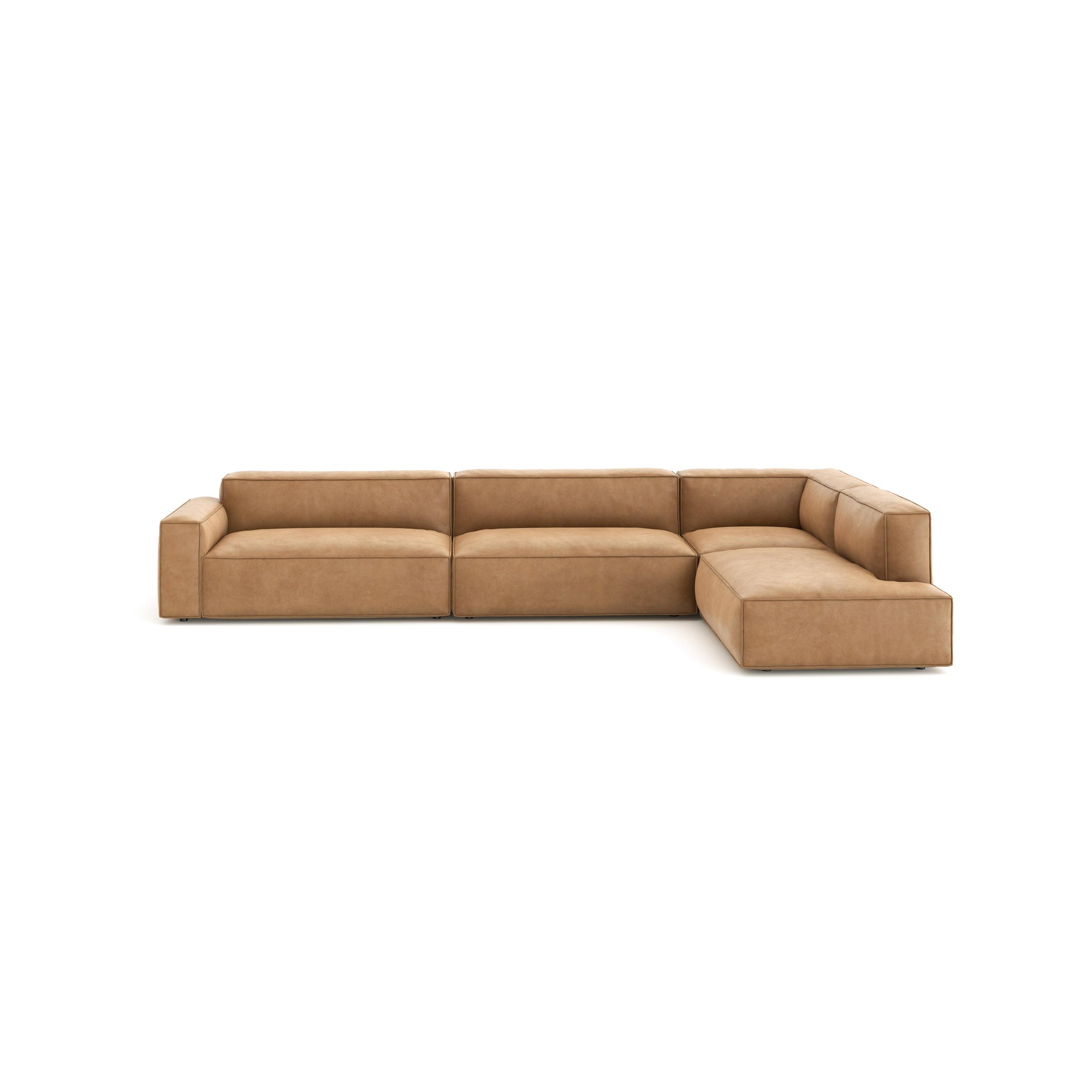 The Baker Modular Sofa | Leather • M8 by Wooden Stories is an L-shaped, modern sofa in light brown leather with wide armrests and low backrests, showcased against a plain white background.