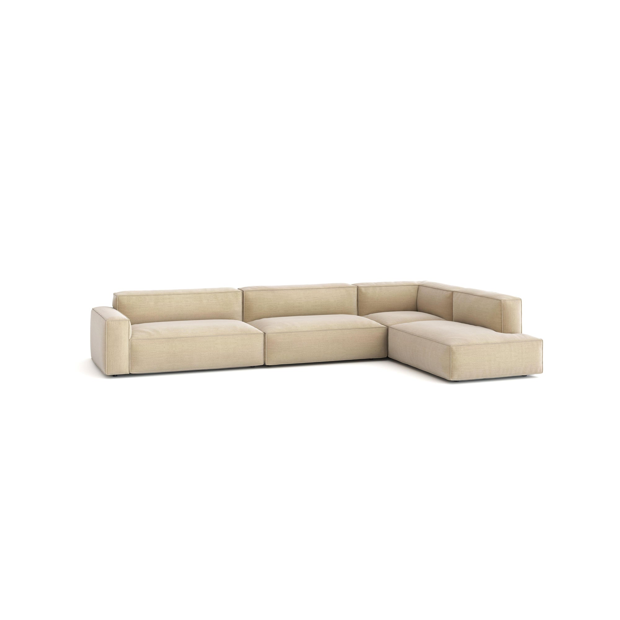 The Baker Modular Sofa | Fabric • M8 by Wooden Stories is a beige L-shaped sofa with thick cushioned seats and backrests, featuring a modern minimalist design with clean lines and no visible legs, shown against a white background.