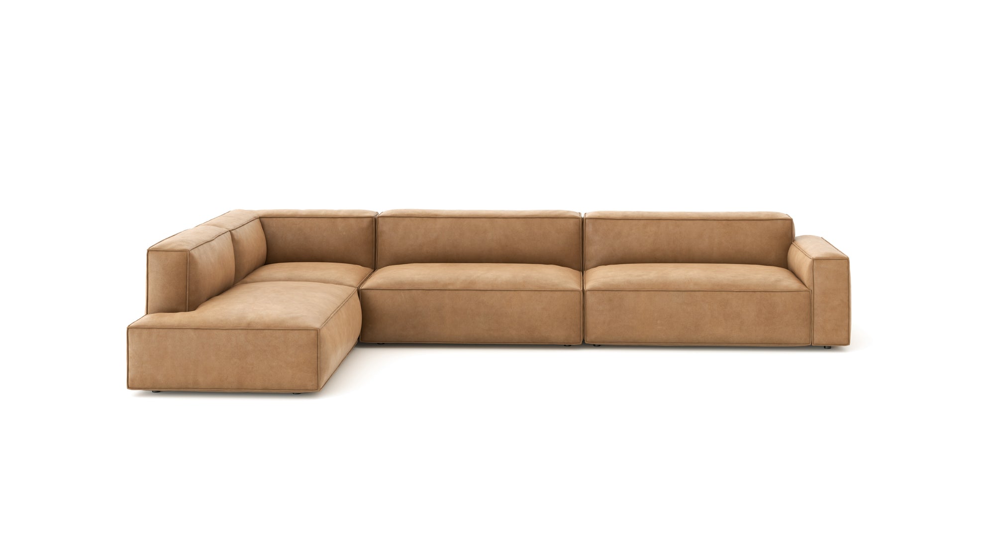 The Baker Modular Sofa | Leather • M8 by Wooden Stories is a modern L-shaped sofa in light brown leather with wide armrests and low backs, shown on a plain white background.