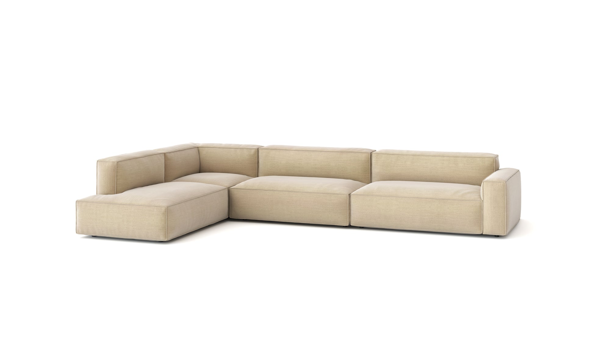 The Baker Modular Sofa | Fabric • M8 by Wooden Stories is a modern L-shaped sofa in light beige, featuring wide arms, deep feather-filled seats, and plush cushions, shown against a plain white background.