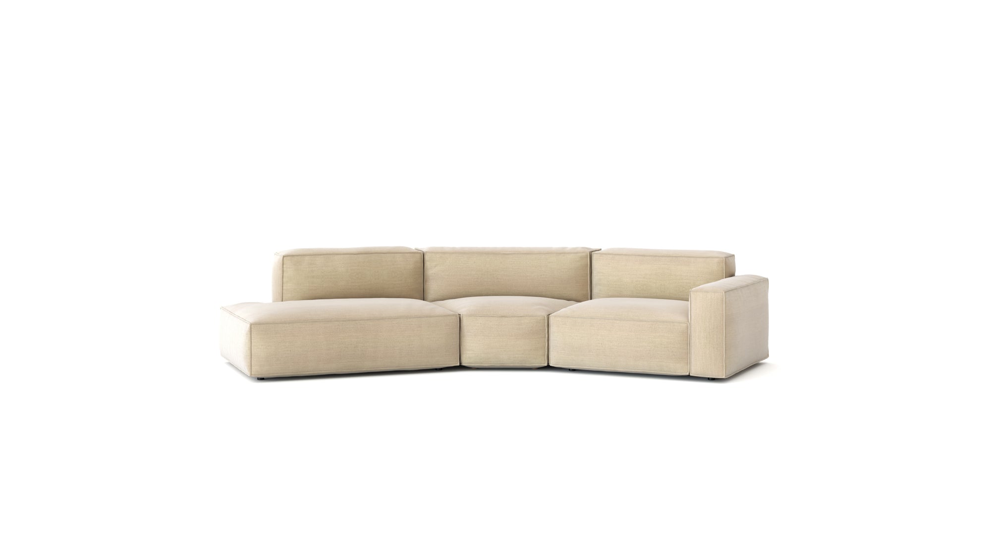 The Baker Modular Sofa | Fabric • M9 by Wooden Stories is a modern light beige sectional with Danish-inspired design, three back and seat cushions, clean lines, and a low-profile silhouette, shown against a plain white background.