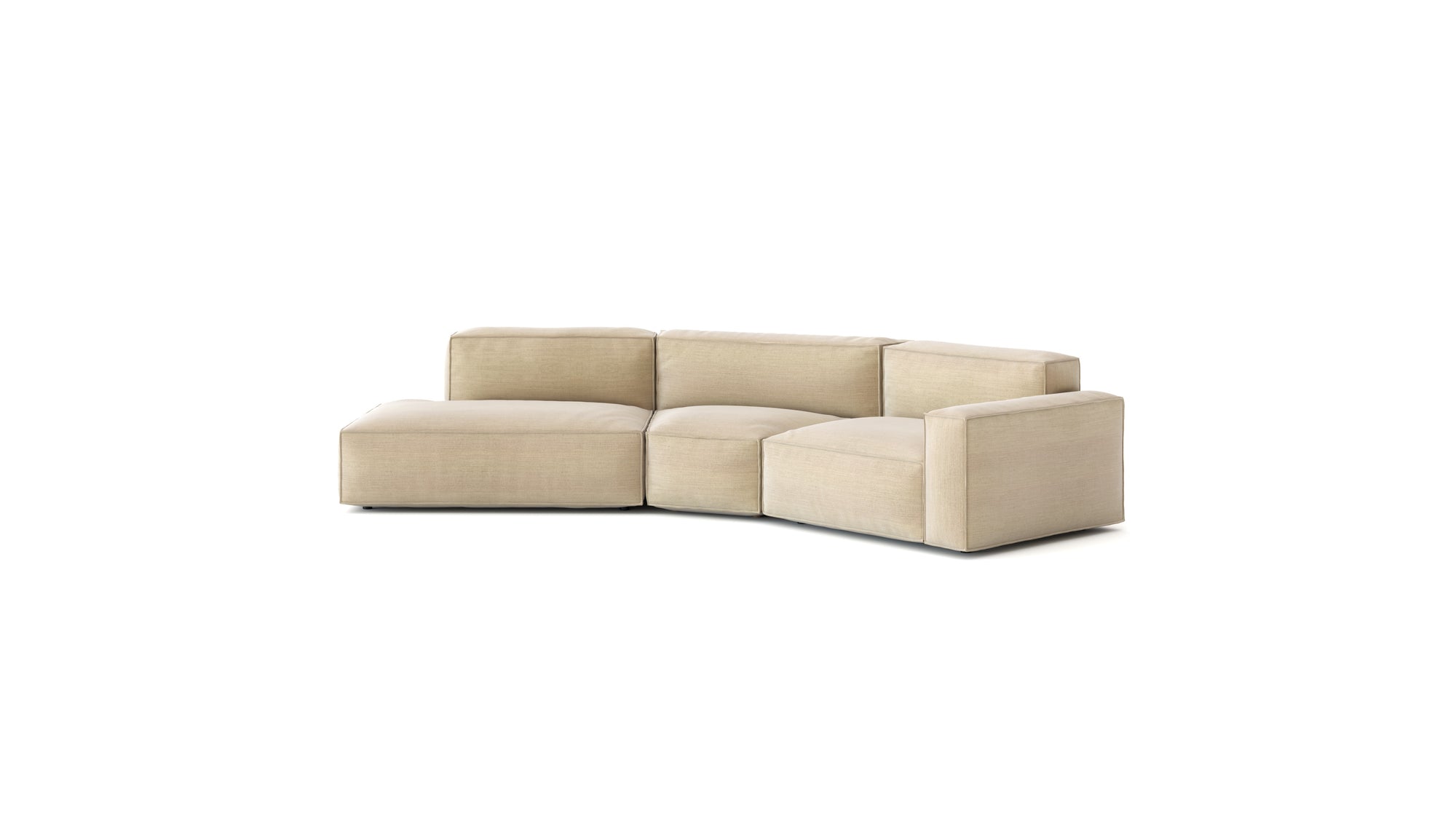 The Baker Modular Sofa | Fabric • M9 by Wooden Stories is a beige, modern sofa with low back and wide seats, featuring three connected segments including a left chaise lounge, embodying contemporary Danish design against a plain white background.