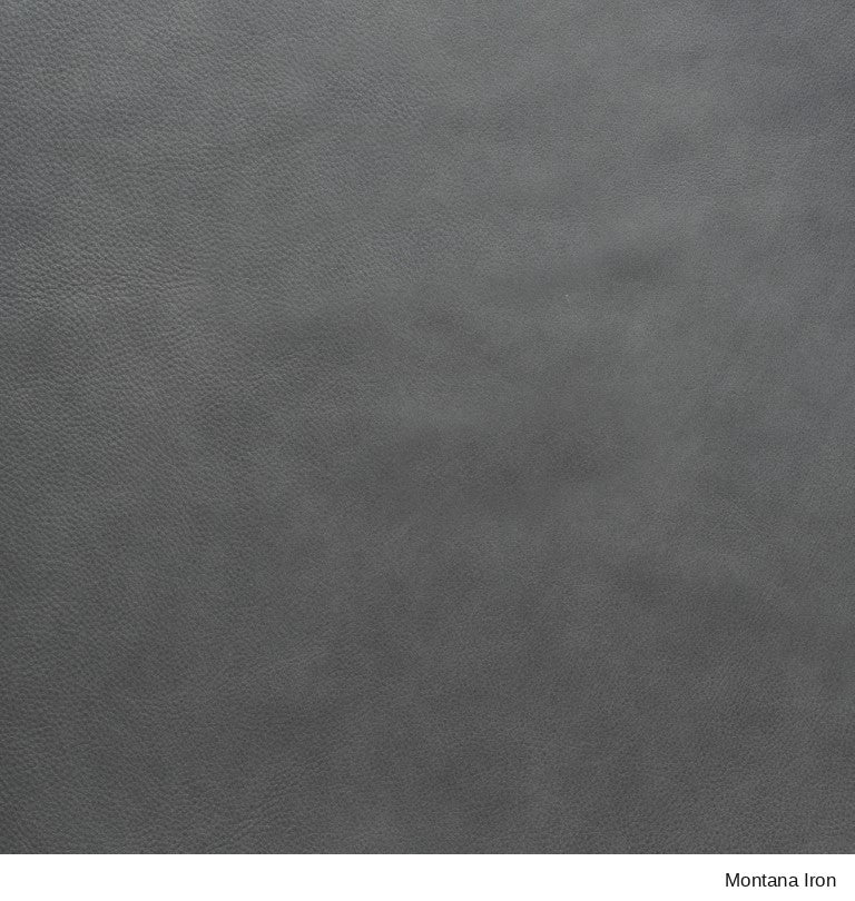 Close-up of a Material Swatches Montana Iron gray leather with a subtle pebbled texture from the Danish Collection.