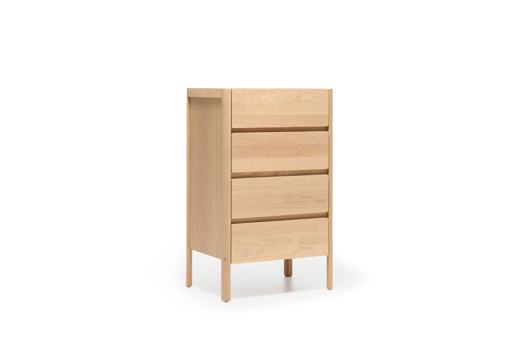 The Nell Tall Dresser by Wooden Stories features a light wood finish and four spacious drawers in a simple, modern design, elevated on four legs. Part of the Danish Collection, this dresser is ideal for bedroom storage and comes equipped with premium metal runners for effortless drawer operation. Set against a plain white background, the dresser stands out as the focal point of the image.