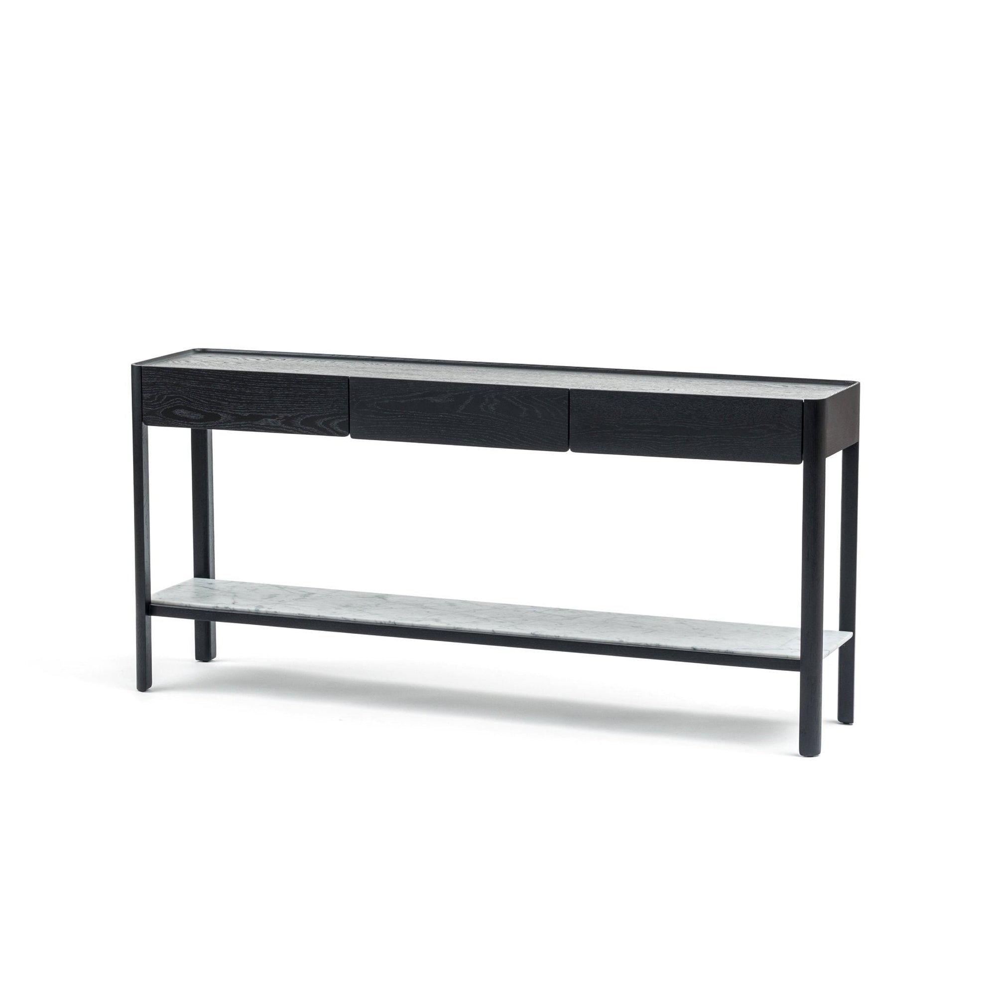 The Nell Console in Black Oak with Stone by Wooden Stories features three drawers, slender legs, and a white marble shelf. Its sleek, minimalistic design is inspired by Scandinavian aesthetics.