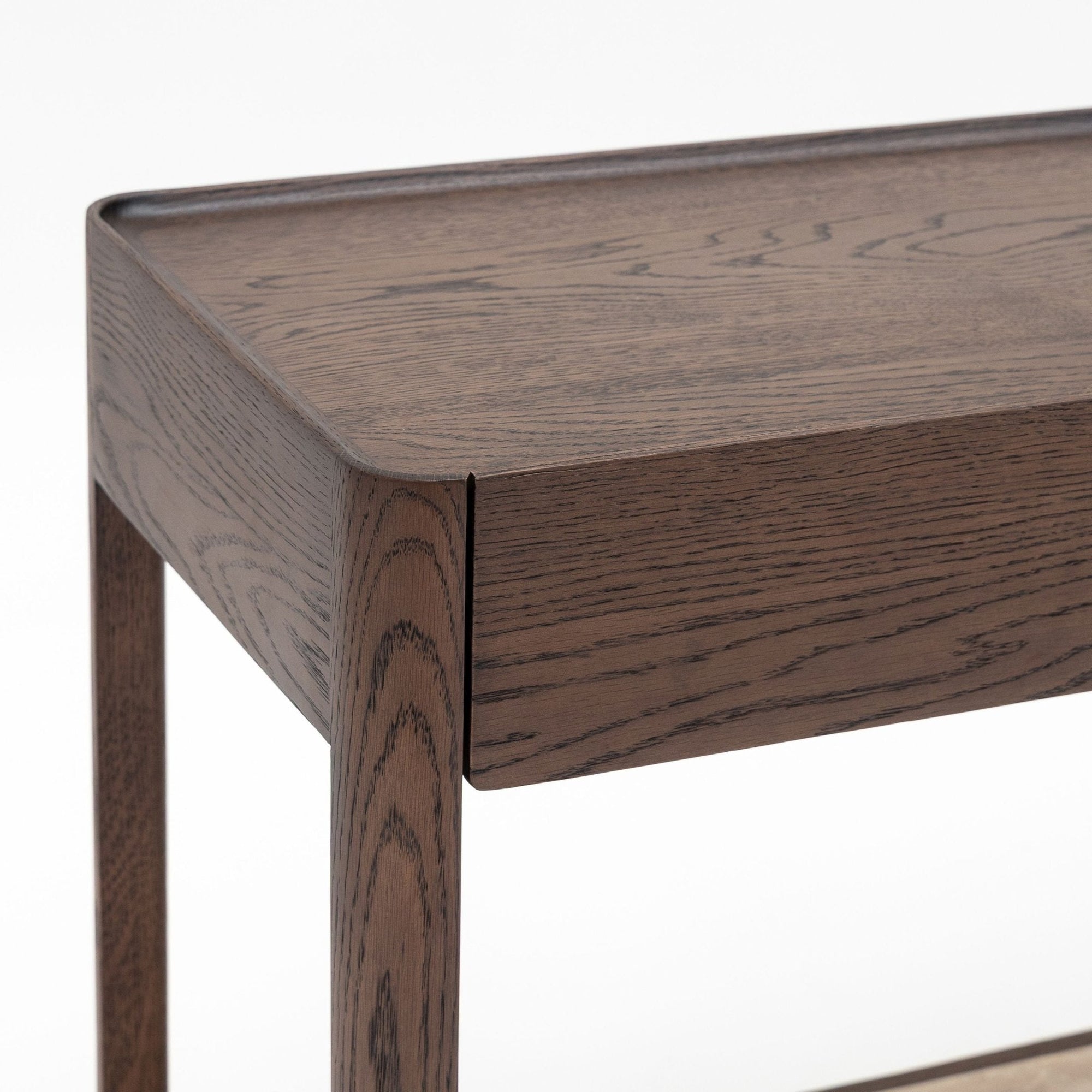 Close-up of the Wooden Stories Nell Console in Espresso Oak with Stone, featuring clean, rounded edges, visible wood grain, modern Scandinavian design, and a tabletop with slightly raised sides.