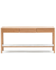 The Nell Console by Wooden Stories, in light oak with stone, features three drawers and a lower white marble shelf, shown against a plain white background.