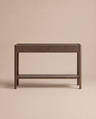 The Nell Console in Espresso Oak by Wooden Stories, crafted from solid oak with two drawers and a lower shelf, stands against a beige background. Its clean lines and minimalist form embody timeless Scandinavian design.