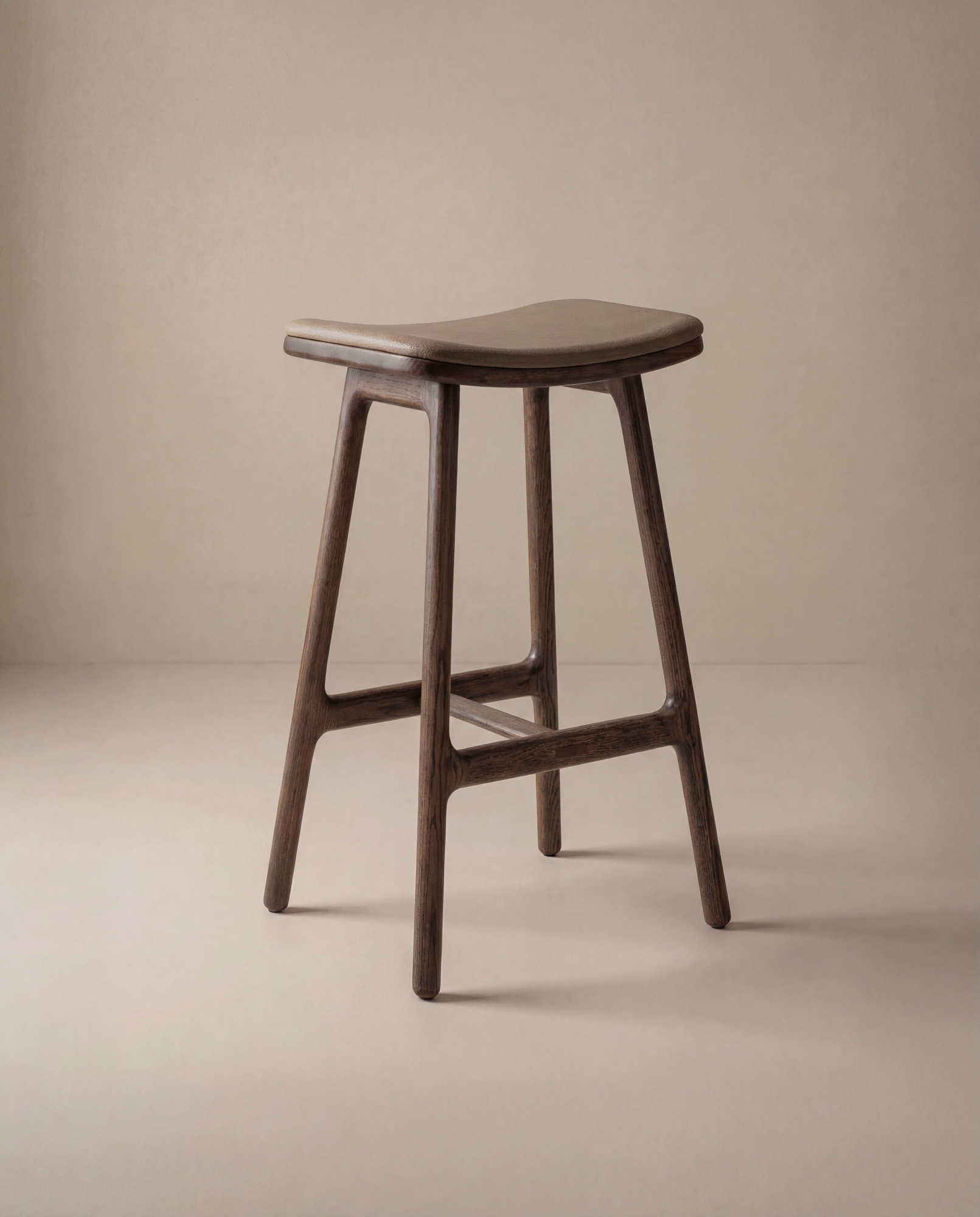 The Odd Counter Stool | Leather by Wooden Stories is perfect for kitchen island seating, featuring a comfortable seat and stylish design.