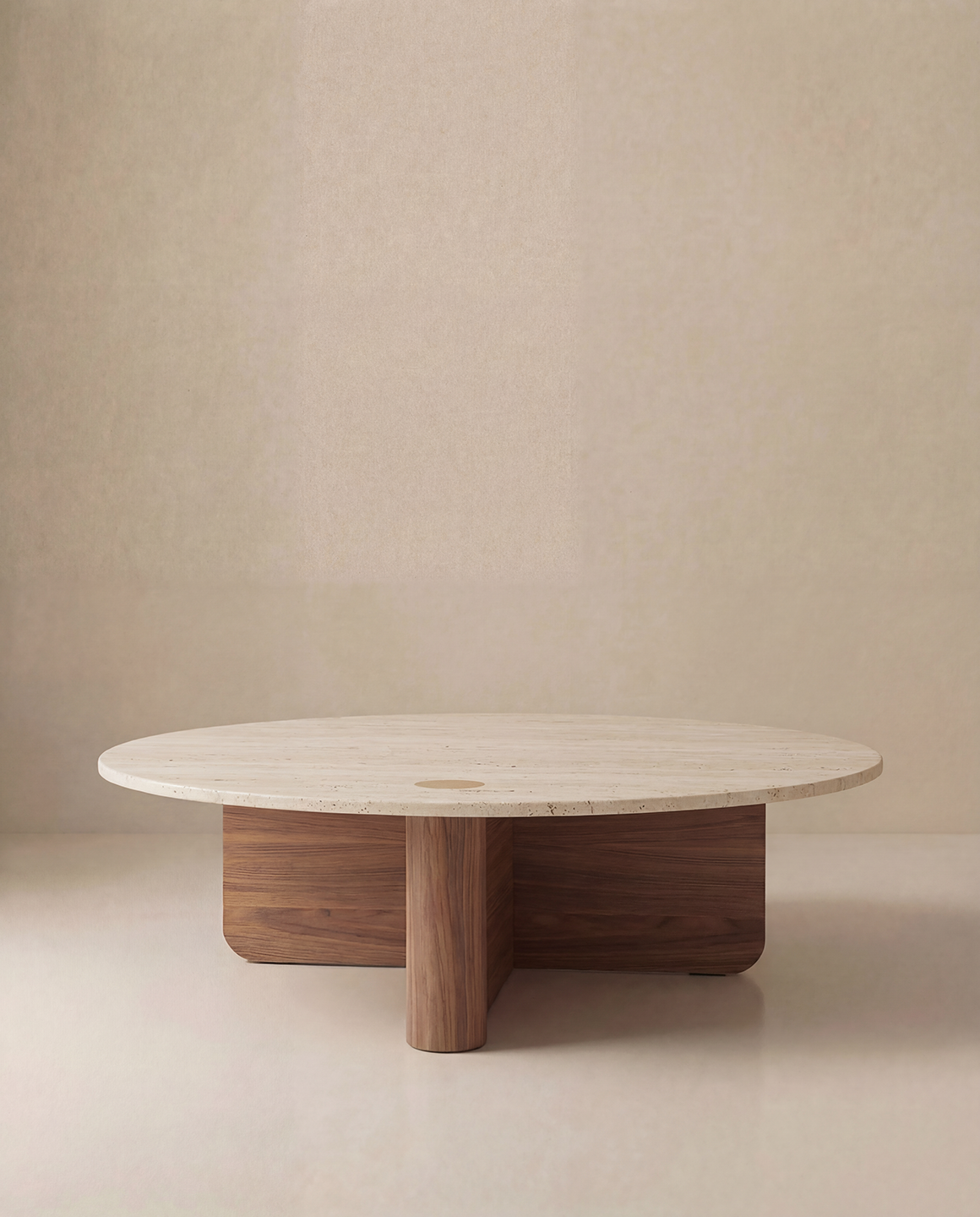 The Pivot Coffee Table | Round - Wood &amp; Stone by Wooden Stories features a smooth, light stone top and intersecting solid oak base, presented against a plain beige background.