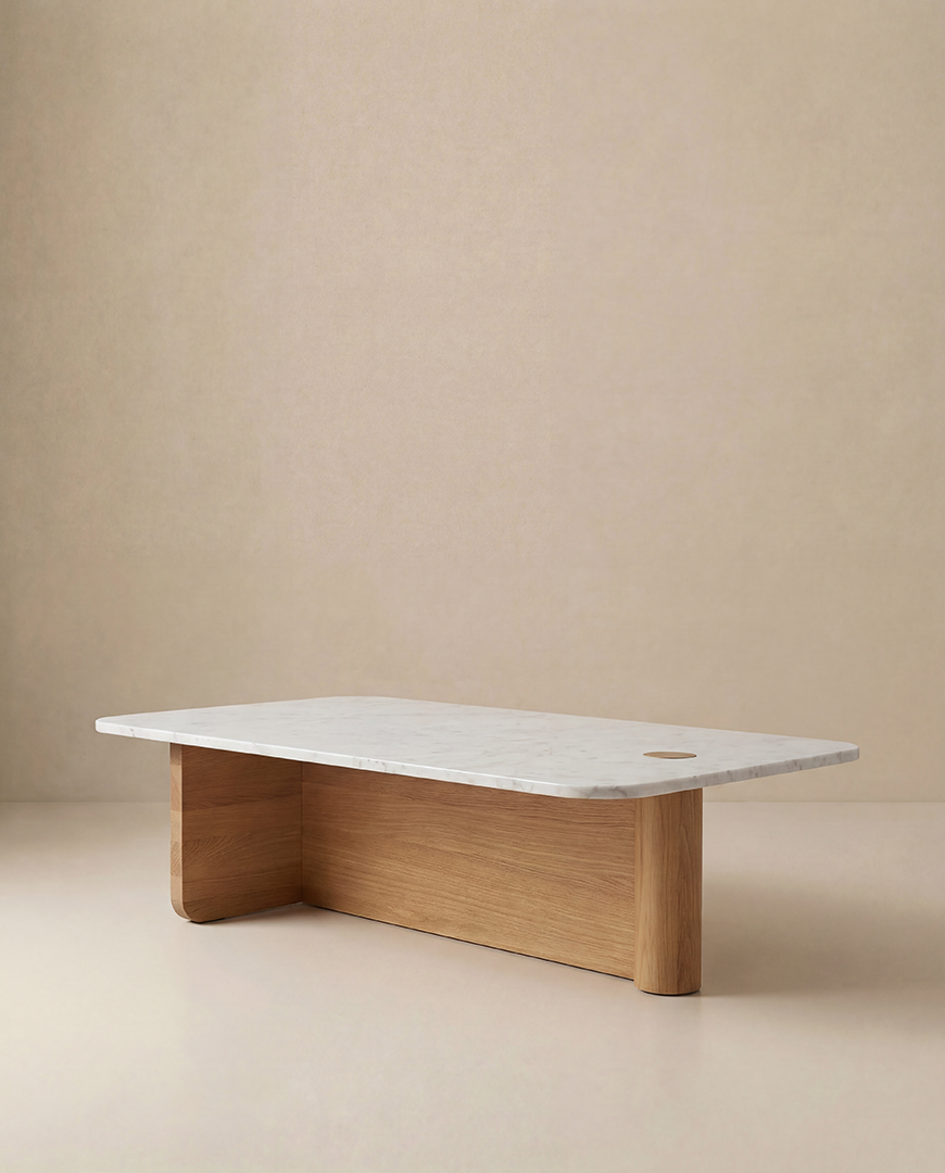 The Pivot Coffee Table | Rectangular - Wood & Stone by Wooden Stories features a solid oak base and a white marble top, displayed against a plain beige background. From the Danish Collection.