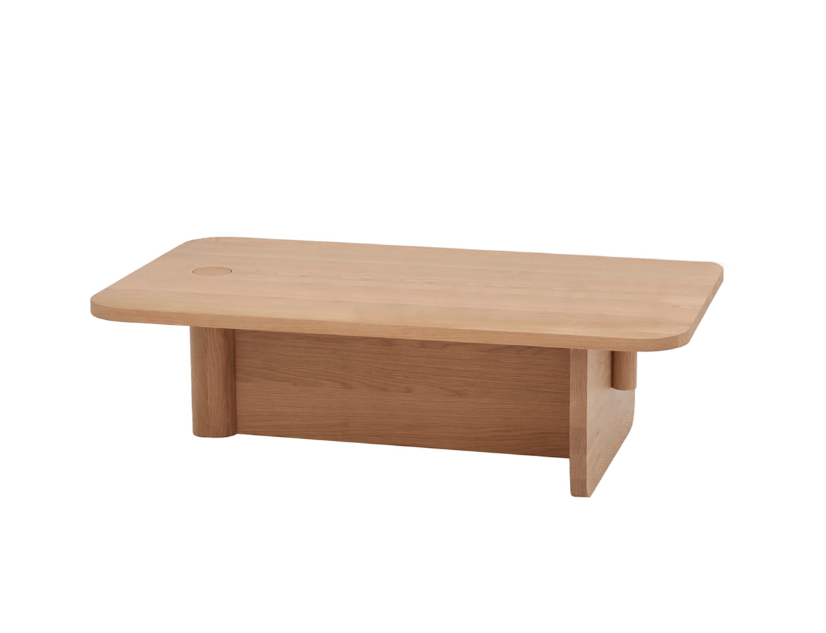 The Pivot Coffee Table | Rectangular - Wood by Wooden Stories features a smooth solid wood surface, rounded edges, minimalist design, small circular detail on top, and sturdy side supports.