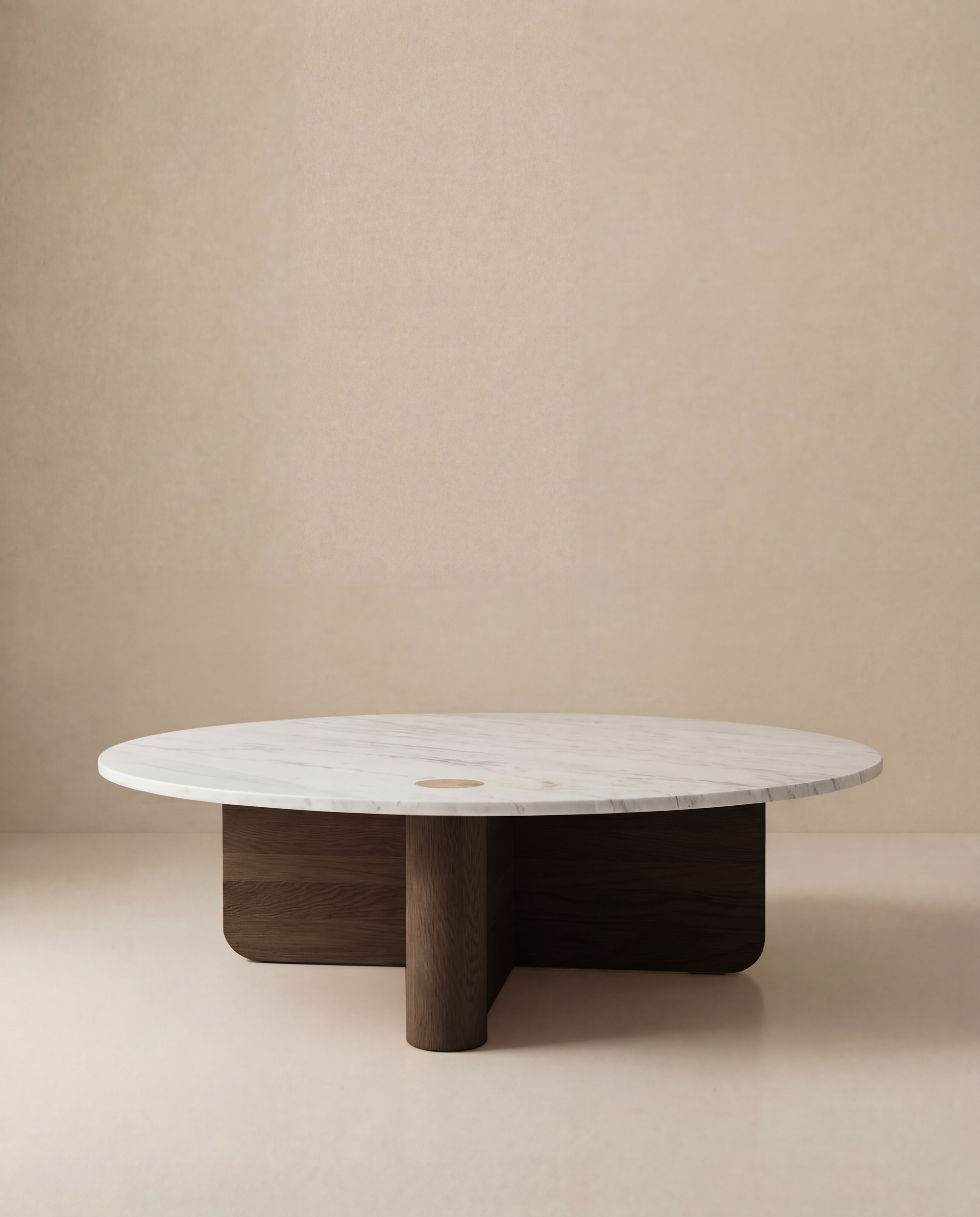 The Pivot Coffee Table | Round - Wood & Stone by Wooden Stories features a white marble top and solid oak base, styled against a plain beige background.