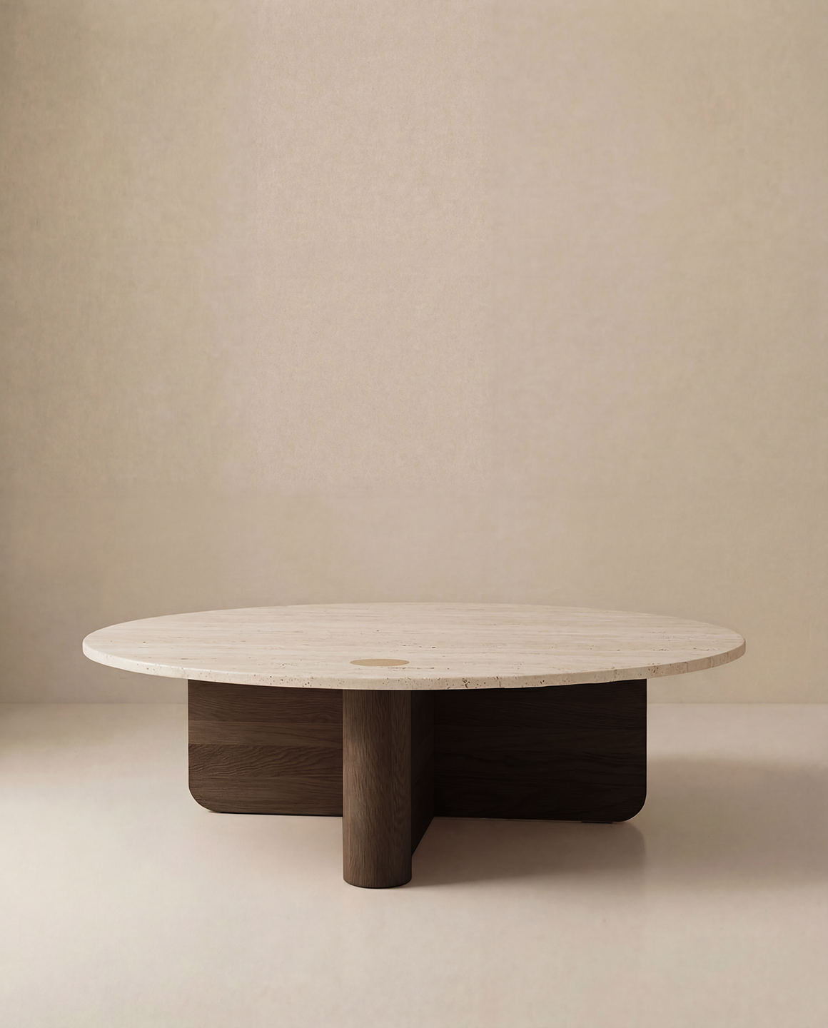 The Pivot Coffee Table | Round - Wood &amp; Stone by Wooden Stories features a light stone top, dark solid oak base, and minimalist Danish-inspired design with clean lines, set against a plain beige background.