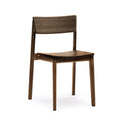 The Poise Dining Chair by Wooden Stories features a minimalist, modern design in espresso oak with a curved backrest and seat, straight legs, and contract-grade quality. Shown here against a plain white background.