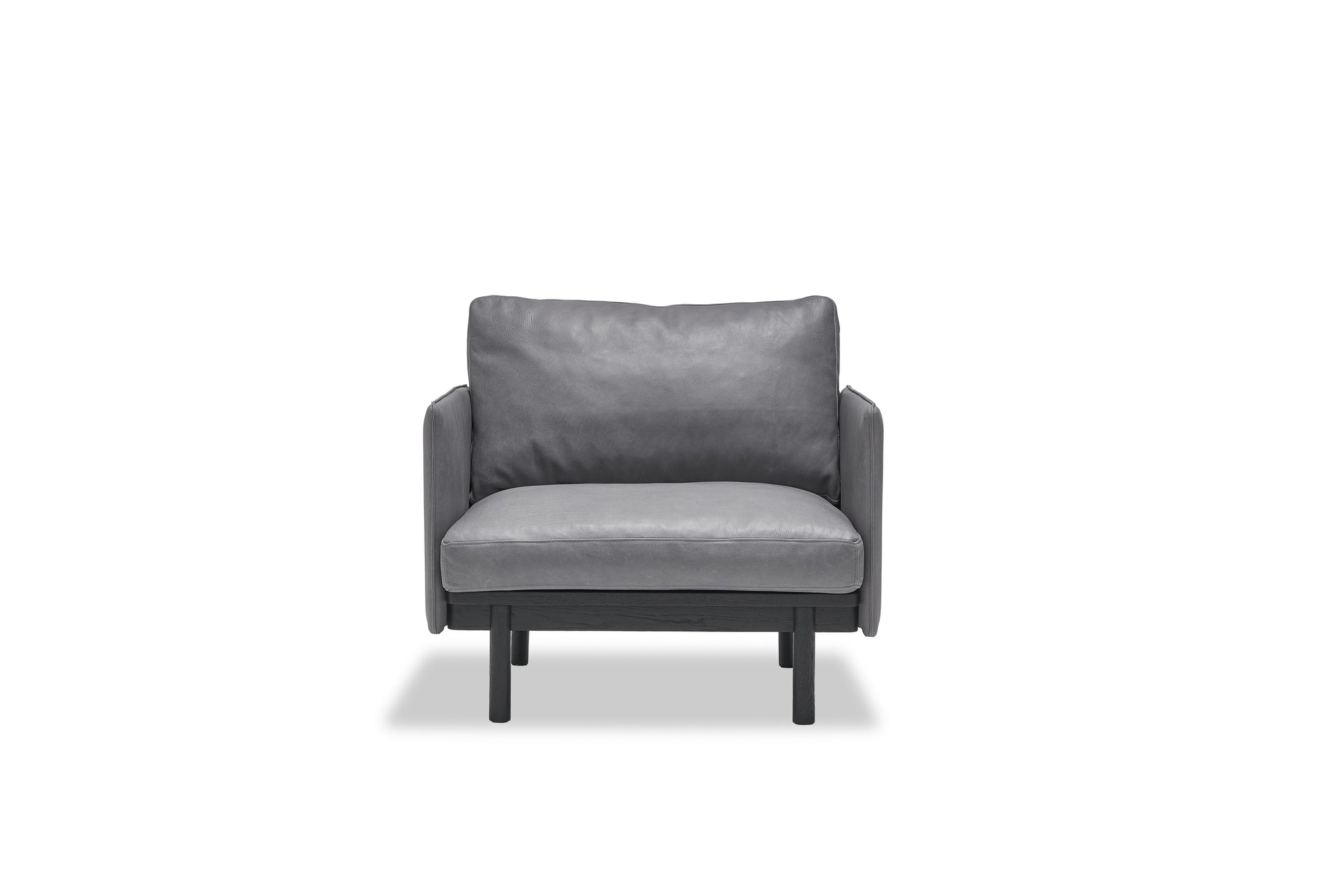 Front view of the Wooden Stories Pensive Lounge Chair | Leather, showcasing sleek Danish lines, leather upholstery, and black legs, set against a plain white background.