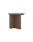 The Pivot Side Table by Wooden Stories features a small, round solid oak top and three Y-shaped legs. Its natural brown finish highlights the wood grain, making it a standout piece against any plain white background.