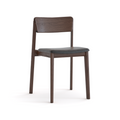 The Poise Dining Chair by Wooden Stories features an espresso oak finish, a straight backrest, cushioned leather seat, and four sturdy legs. Its simple modern design is inspired by the Danish Collection and built to contract grade standards.