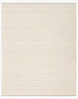 The Sloane Rug - Mist by Loloi is a square, flat-weave rug in a solid off-white or cream tone, showcasing subtle horizontal lines across its hand-woven surface. With its smooth texture and understated, neutral look, this rug is a perfect fit for modern bohemian interiors.
