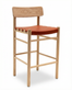 The SOBU Cesco Counter Stool features a light solid American white ash frame, a simple rectangular backrest, and a reddish-brown top grain leather seat with stitched edging.