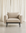 Beige upholstered Attendant Lounge Chair | Fabric from the Danish Collection with a low-profile black frame.