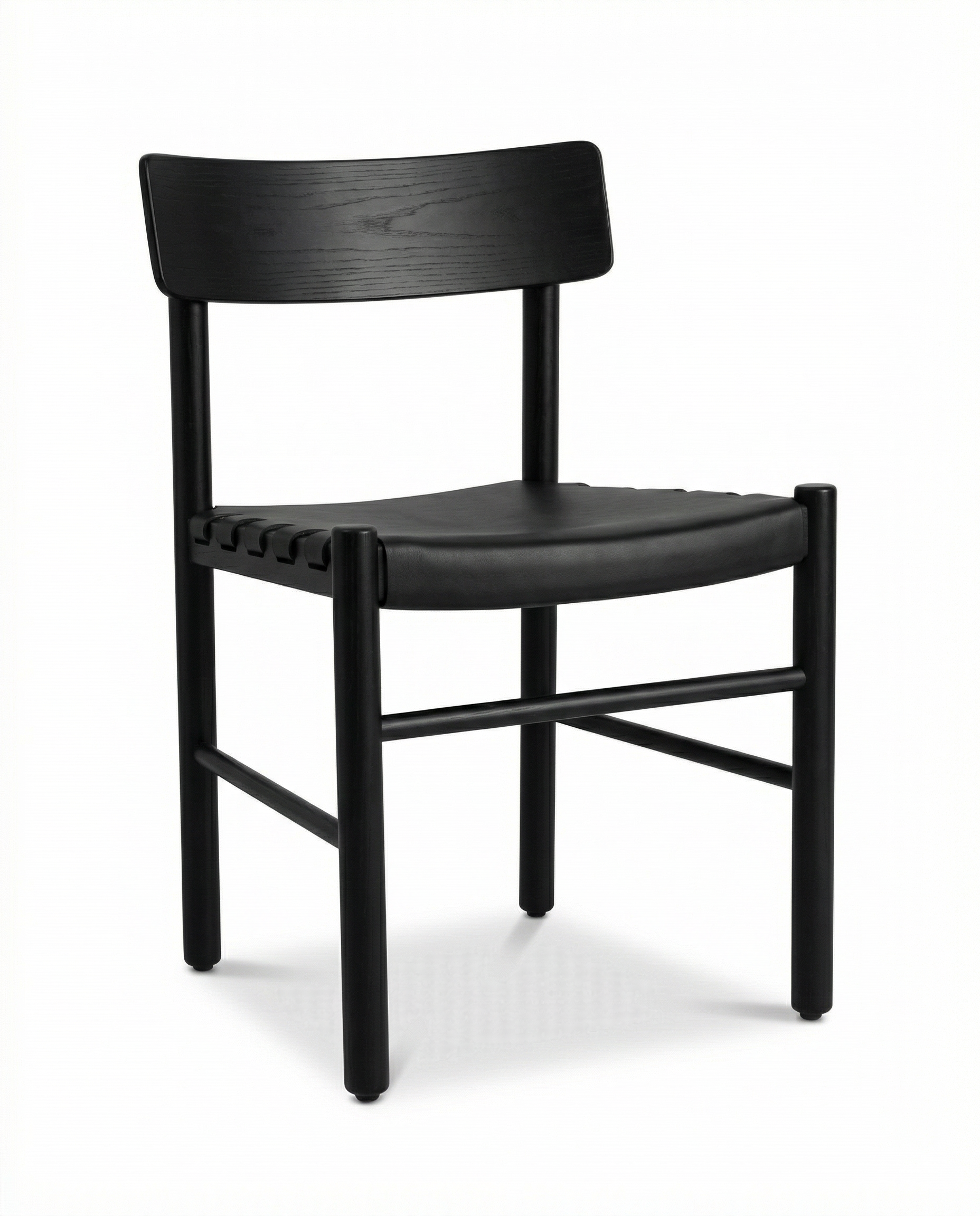 The Cesco Dining Chair - Black Ash by SOBU features a modern solid American ash frame with a curved backrest, square seat, and cylindrical legs, shown against a plain white background.
