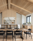 Certainly! Here is a rewritten version of your sentence using the provided product data: Modern kitchen and dining area with light wood finishes, vaulted ceiling, marble backsplash, black chairs surrounding the Mars Live Edge Dining Table in White Ash with Brass T Legs by SOBU, large windows, and minimalist decor.