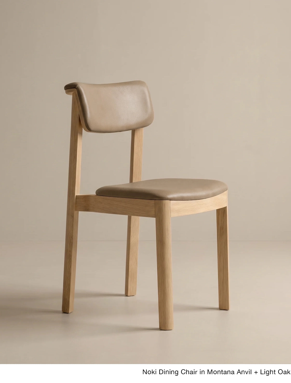 Contract-grade Noki Dining Chair | Leather in light oak featuring a curved, taupe leather backrest and seat.