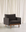 The Pensive Lounge Chair | Fabric by Wooden Stories, in modern dark gray with wooden legs, sits on a light floor before white curtains, showcasing mid-century Danish design elegance.