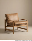 The Troubadour Lounge Chair | Leather by Wooden Stories features a light oak frame and tan leather cushions, shown against a plain beige background.