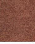 A close-up of a rust-colored Material Swatches textile from the Danish Collection, labeled Sahara Russet.