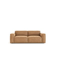 The Baker Sofa | Leather by Wooden Stories features a modern tan design with wide armrests and cushioned seats, shown against a plain white background—a striking piece of contemporary furniture.
