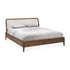 The Spindle Bed - Teak by Ethnicraft, crafted from reclaimed FSC-certified teak, features a slatted headboard and is shown with light gray bedding and matching pillows against a white background.