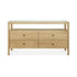 The Ethnicraft Spindle Dresser - Oak features four drawers with round black knobs, an open top shelf, and minimalist straight-leg design in a light wood finish, capturing the timeless aesthetic of the Spindle collection.