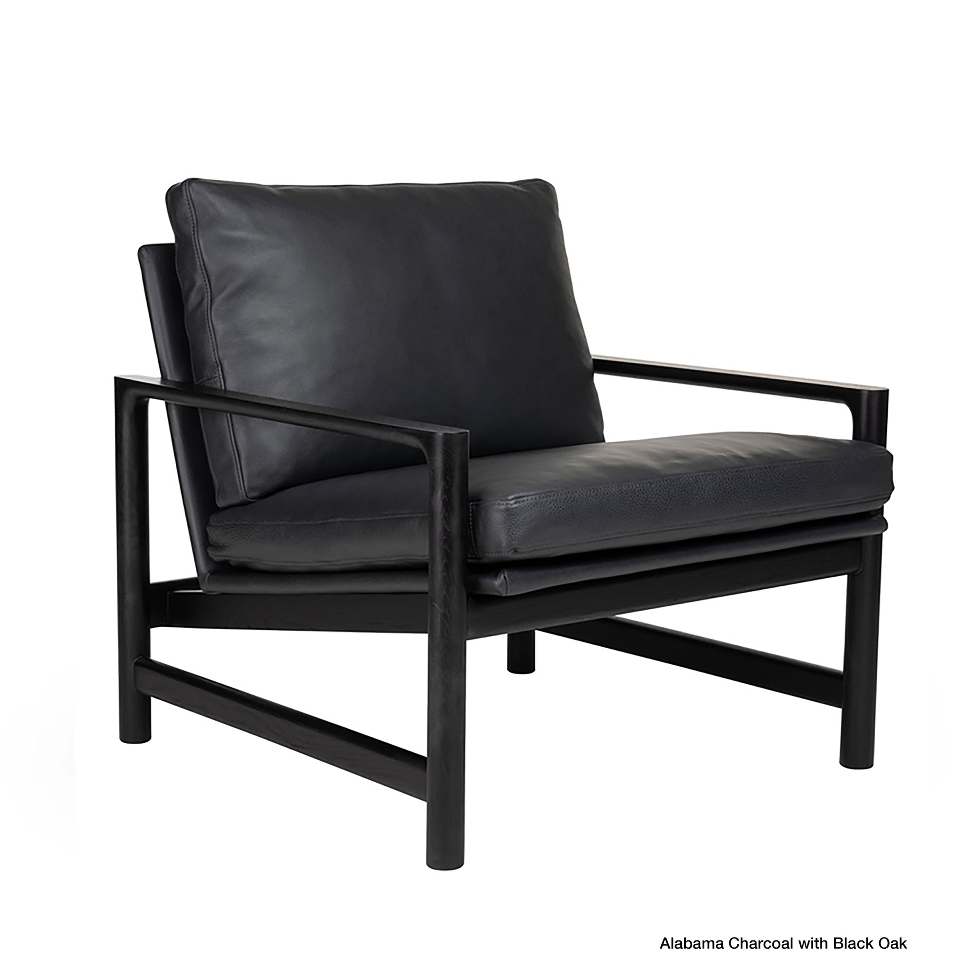Experience modern minimalism with the Troubadour Lounge Chair | Leather by Wooden Stories. This sleek black lounge chair features a sturdy black metal frame, generously cushioned leather seat and back, and open sides. The squared arms and legs offer a contemporary, Danish-inspired silhouette for a refined yet comfortable addition to your living space.