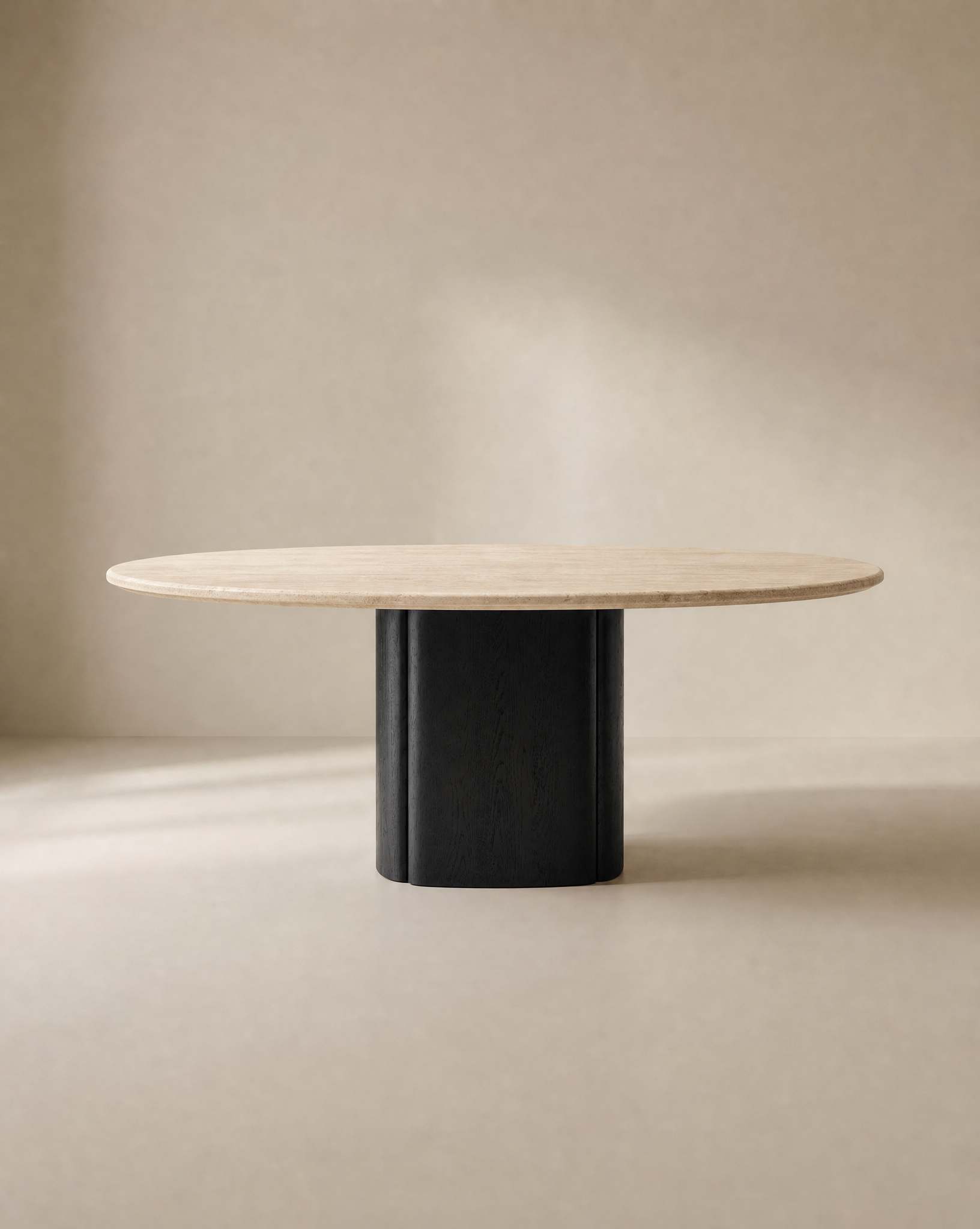 The Wooden Stories Tathra Round Dining Table features a stone top and a thick black cylindrical base, showcased against a plain beige background.